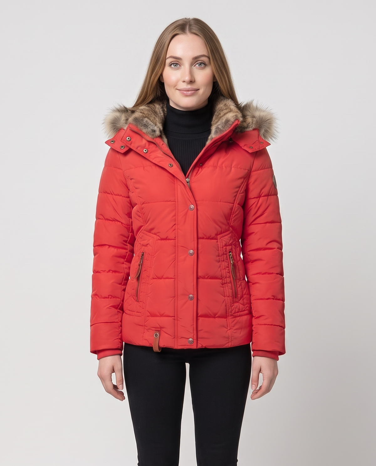 Women's quilted winter puffer jacket with a faux fur lined hood, snap button placket over a zip, zip pockets with leather pulls and a fitted waist in Red, front view
